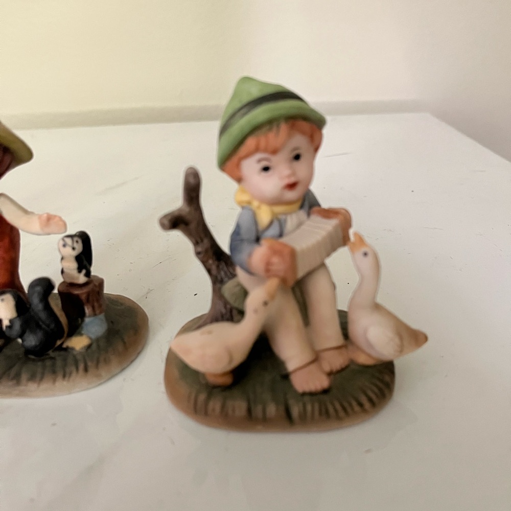 Three Napco Porcelain Figurine. All three Figurines in great condition.